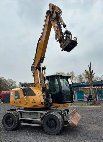 Liebherr 918 Mobilbagger mit OilQuick Schnellwechsler zur Miete bei Weber-Herbst